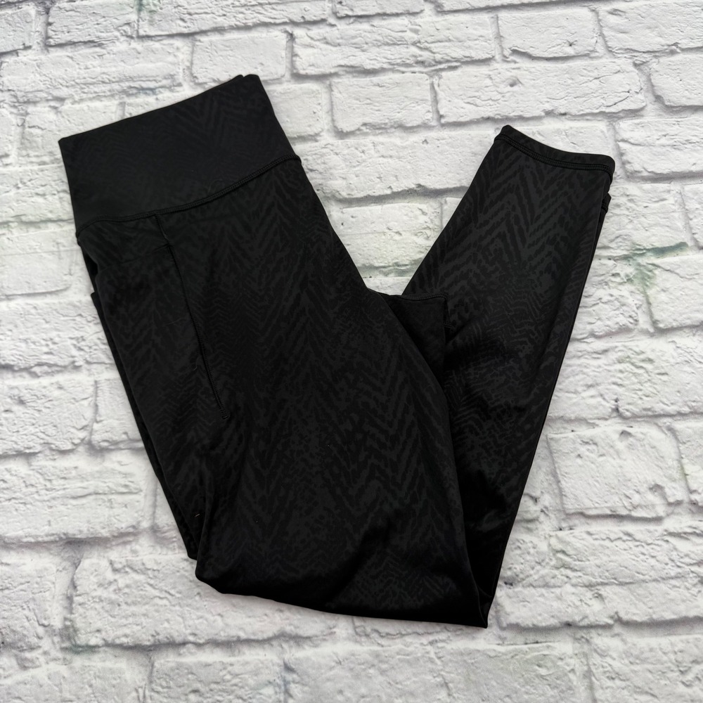 Athleta Salutation Stash Pocket II 7/8 Tight Black Tonal Print Leggings Large